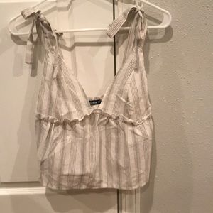 Shein size xs never worn. Cute tank with tie straps. Cream with gray stripes.